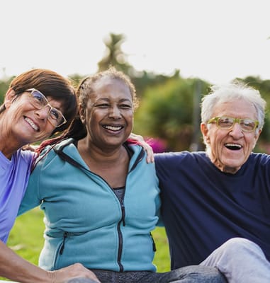 Residents enjoying time outdoors with staff