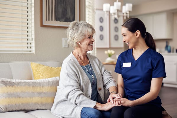 Caregiver and resident sharing a moment together