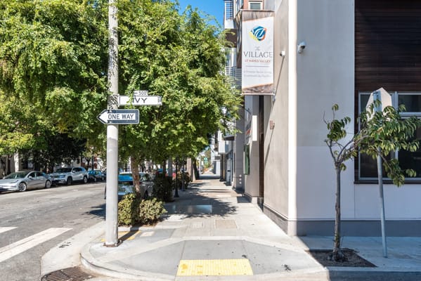 Exterior view of The Village at Hayes Valley with signage