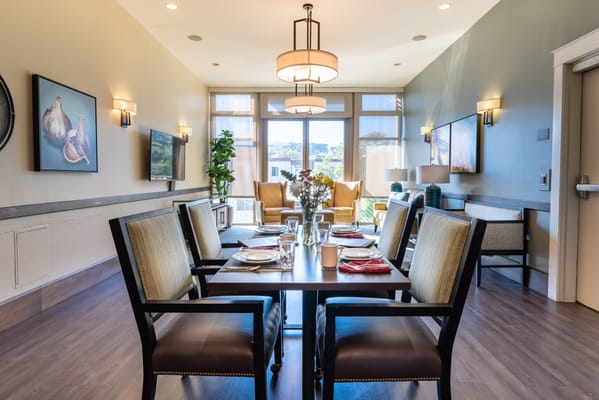 Dining area with set table and seating