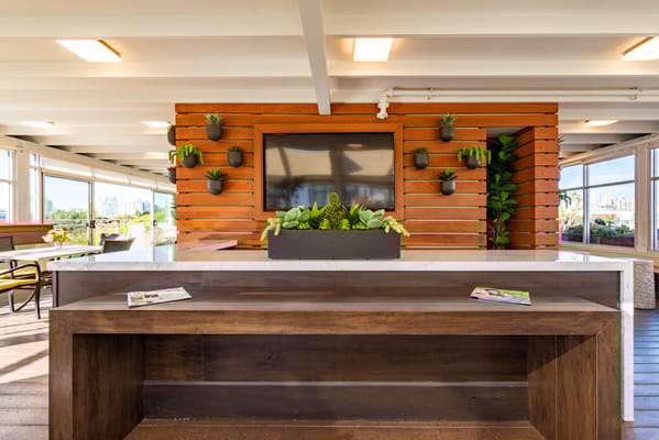 Bright interior common area with plants and seating