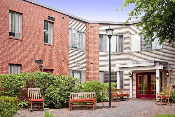 Exterior view of the Marshwood Center with seating area
