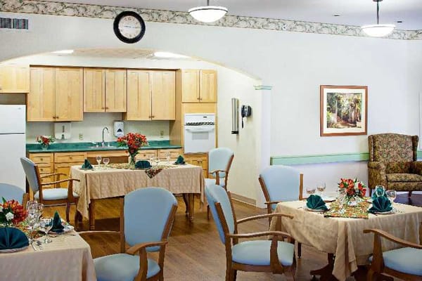 Interior dining area with tables set for a meal