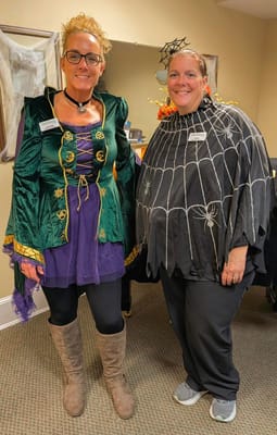 Staff members in costumes during an event
