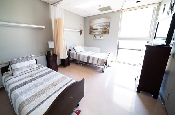Interior view of a shared resident room with two beds