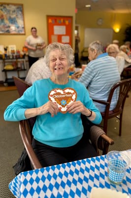 Resident celebrating Oktoberfest in a common area