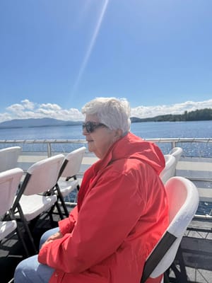 A resident enjoying a boat ride on a sunny day