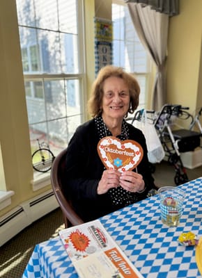 Resident enjoying Oktoberfest celebration indoors