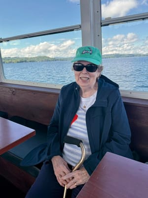 Resident enjoying a scenic boat ride on the lake