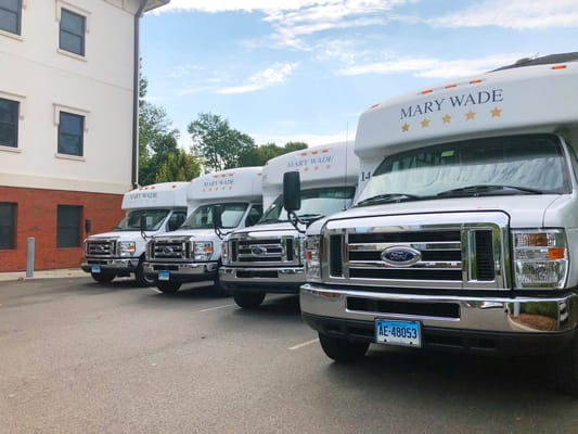 Facility transport vehicles parked outside