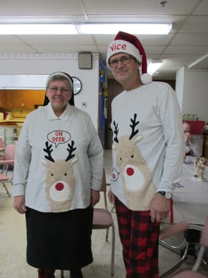 Residents dressed in festive reindeer attire for a celebration