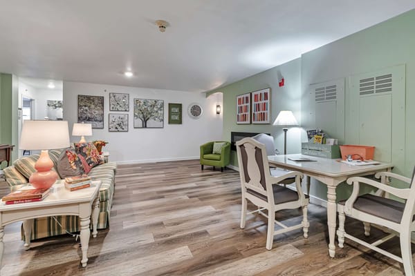Bright common area with seating and decor