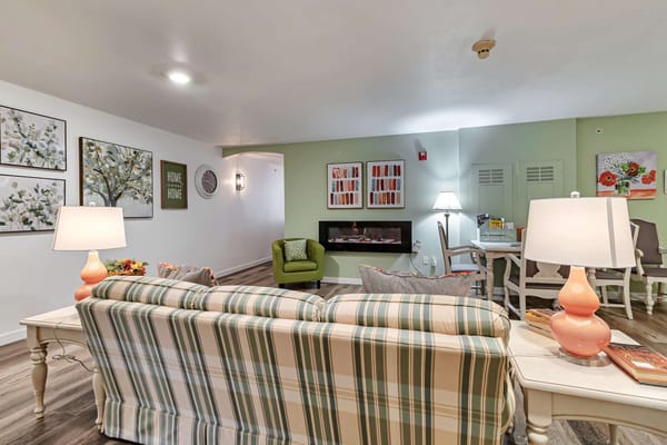 Interior view of a cozy common area with seating