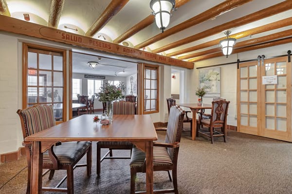 Interior view of a common area with tables and chairs