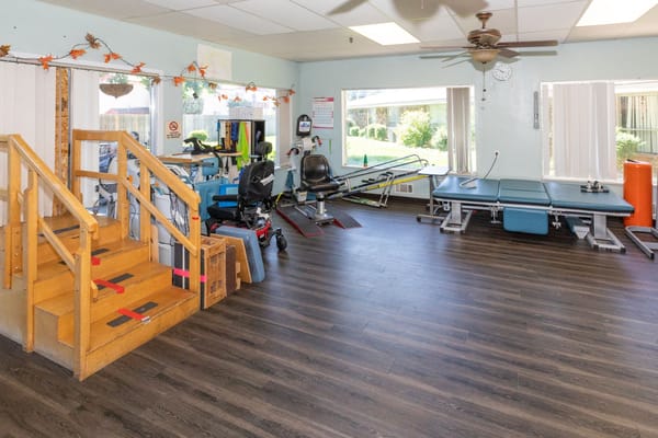 Interior therapy room with equipment and seating