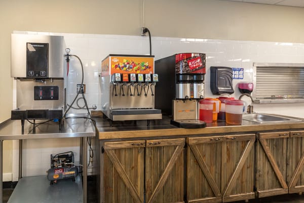 Beverage station in a dining area with dispensers