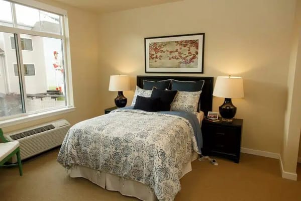 Cozy bedroom setup with floral decor and lighting