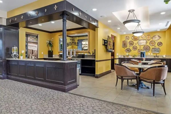 Bright dining area with tables and chairs
