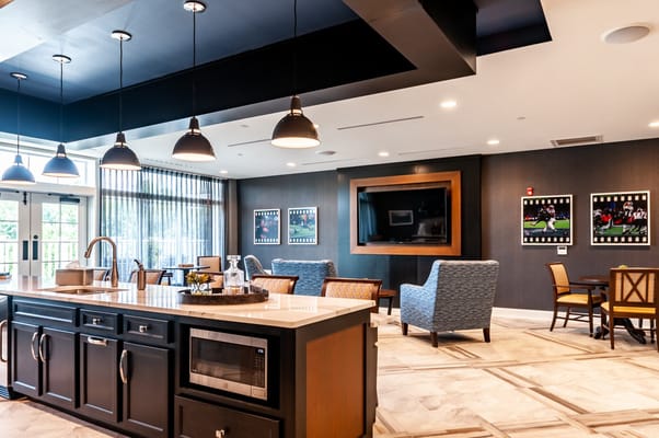 Interior common area with seating and TV