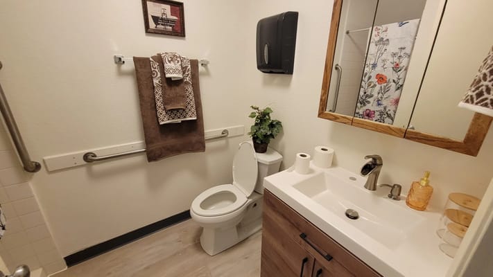 Clean bathroom in a senior living facility room