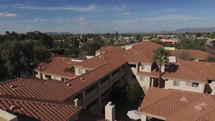 Aerial view of a senior living facility with rooftops