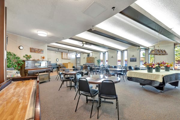 Interior dining area with tables and chairs