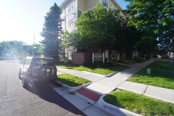 Exterior view of Sunrise at Cherry Creek with signage