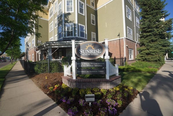Exterior view of Sunrise Senior Living sign and building