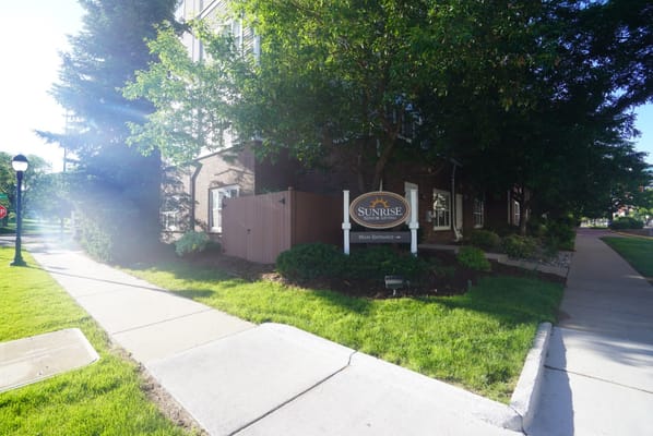 Exterior view of Sunrise at Cherry Creek signage