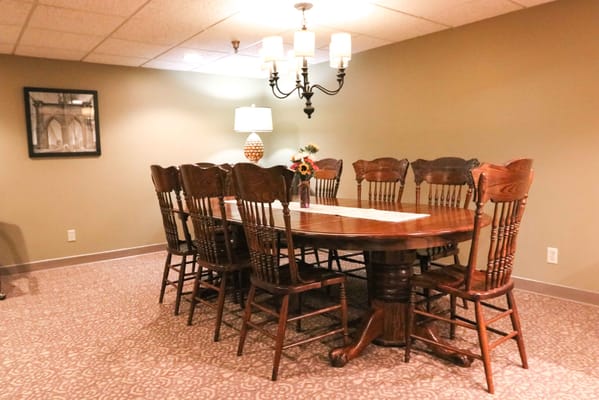 Interior dining area with a large table and chairs
