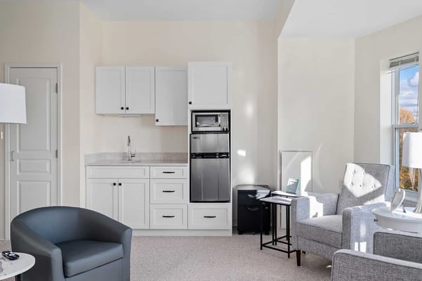 Cozy interior of a resident room with kitchenette