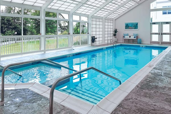 Indoor swimming pool with large windows