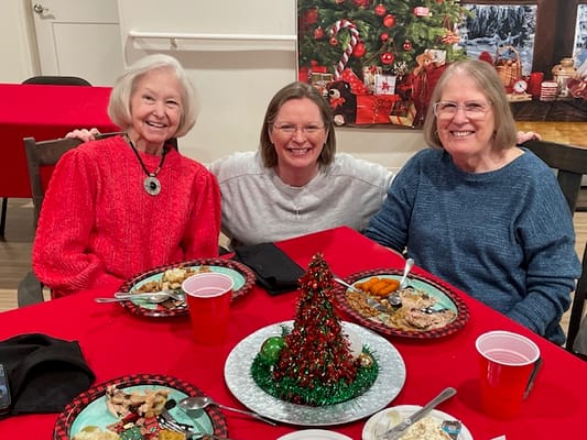 Residents enjoying a meal together during a celebration