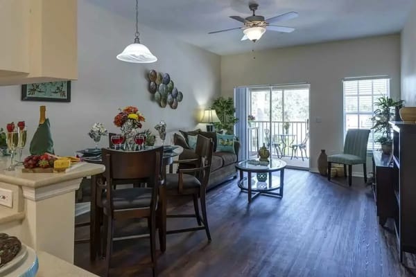 Cozy interior of a resident's unit with dining and living space