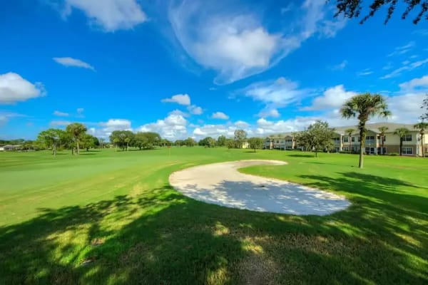 Scenic view of green landscape with blue skies