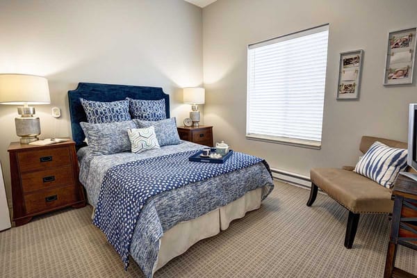 Cozy private bedroom in a senior living facility