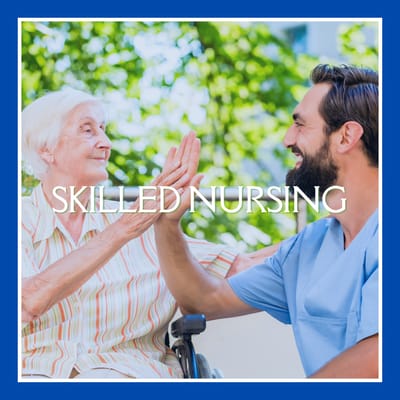 A caregiver and resident sharing a joyful moment outdoors
