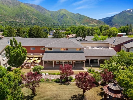 Aerial view of the assisted living facility surrounded by mountains