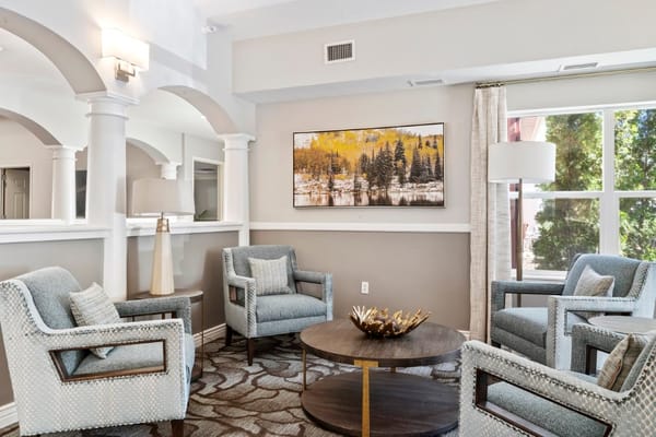 Bright common area with seating and decor