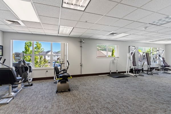 Interior view of a fitness room with exercise equipment