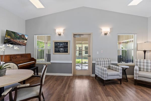 Interior common area with seating and piano