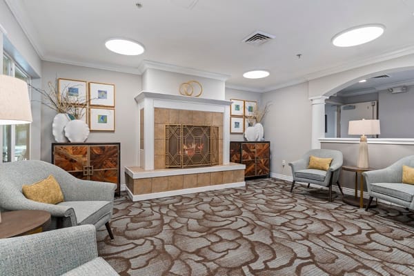 Cozy common area with a fireplace and seating