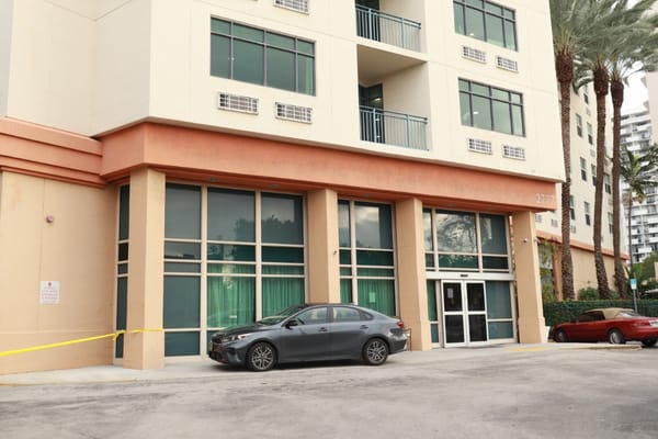 Exterior view of the Sterling Aventura building entrance