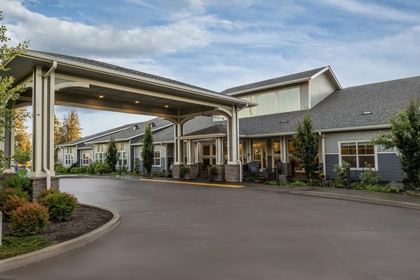 Entrance of an assisted living facility with parking area