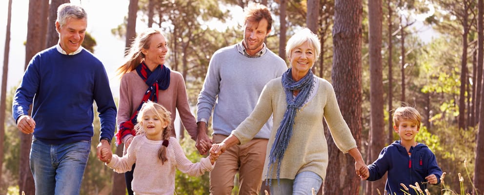 Families enjoying a walk in a serene outdoor space