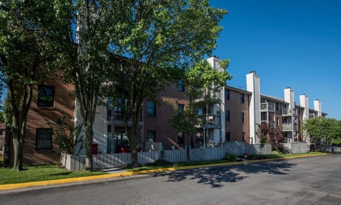 Exterior view of a nursing home facility with trees