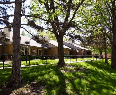 View of the facility exterior with landscaped garden