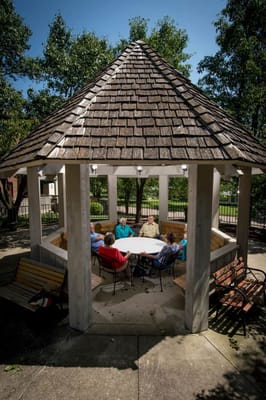 Residents enjoying time together in a gazebo