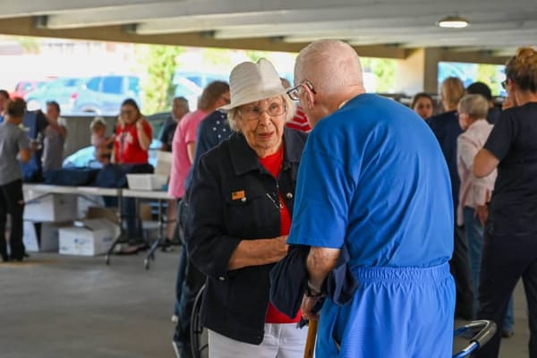 Residents interacting during a community gathering