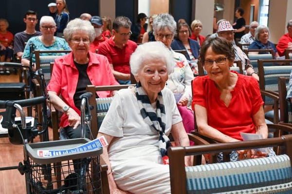 Residents enjoying an event in the common area